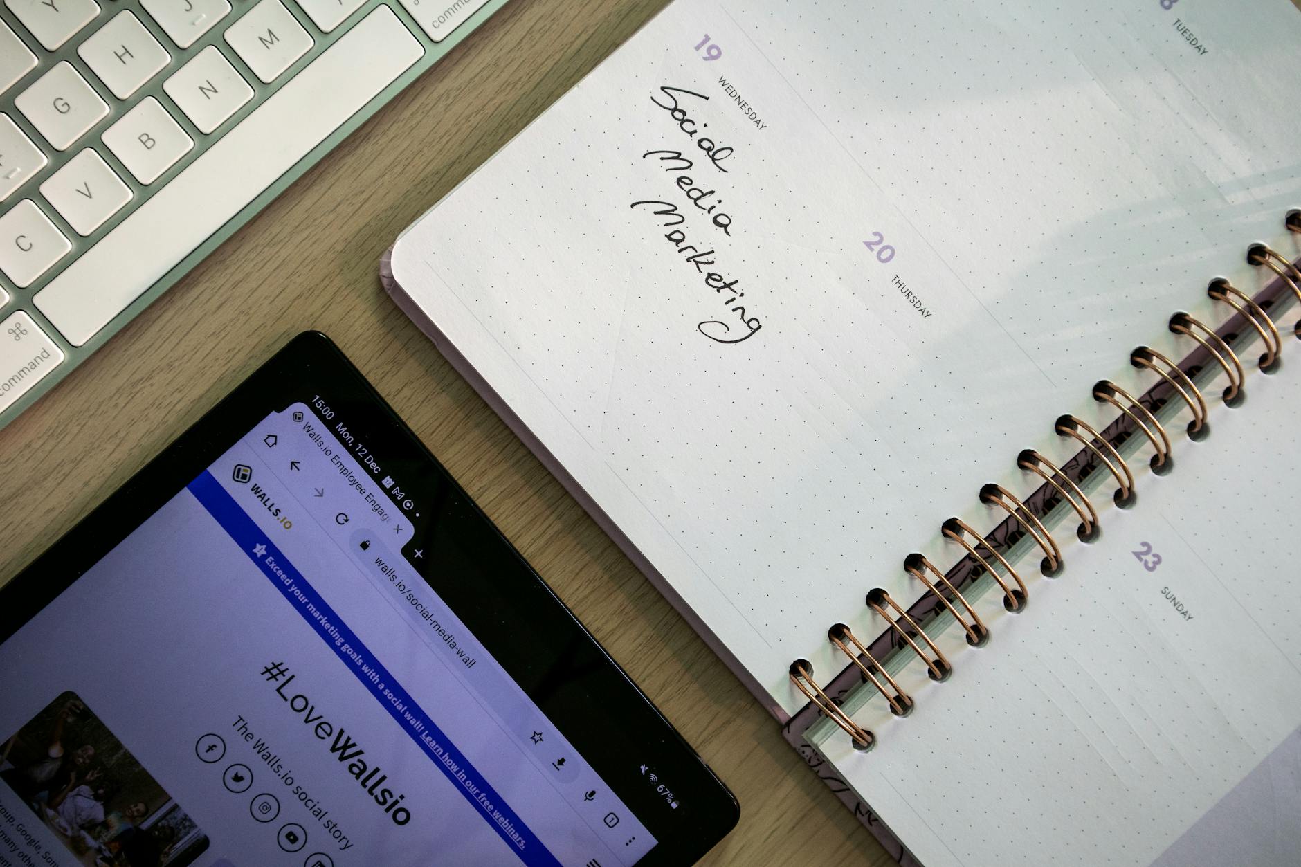 Small business owners creating social media calendar planning strategy