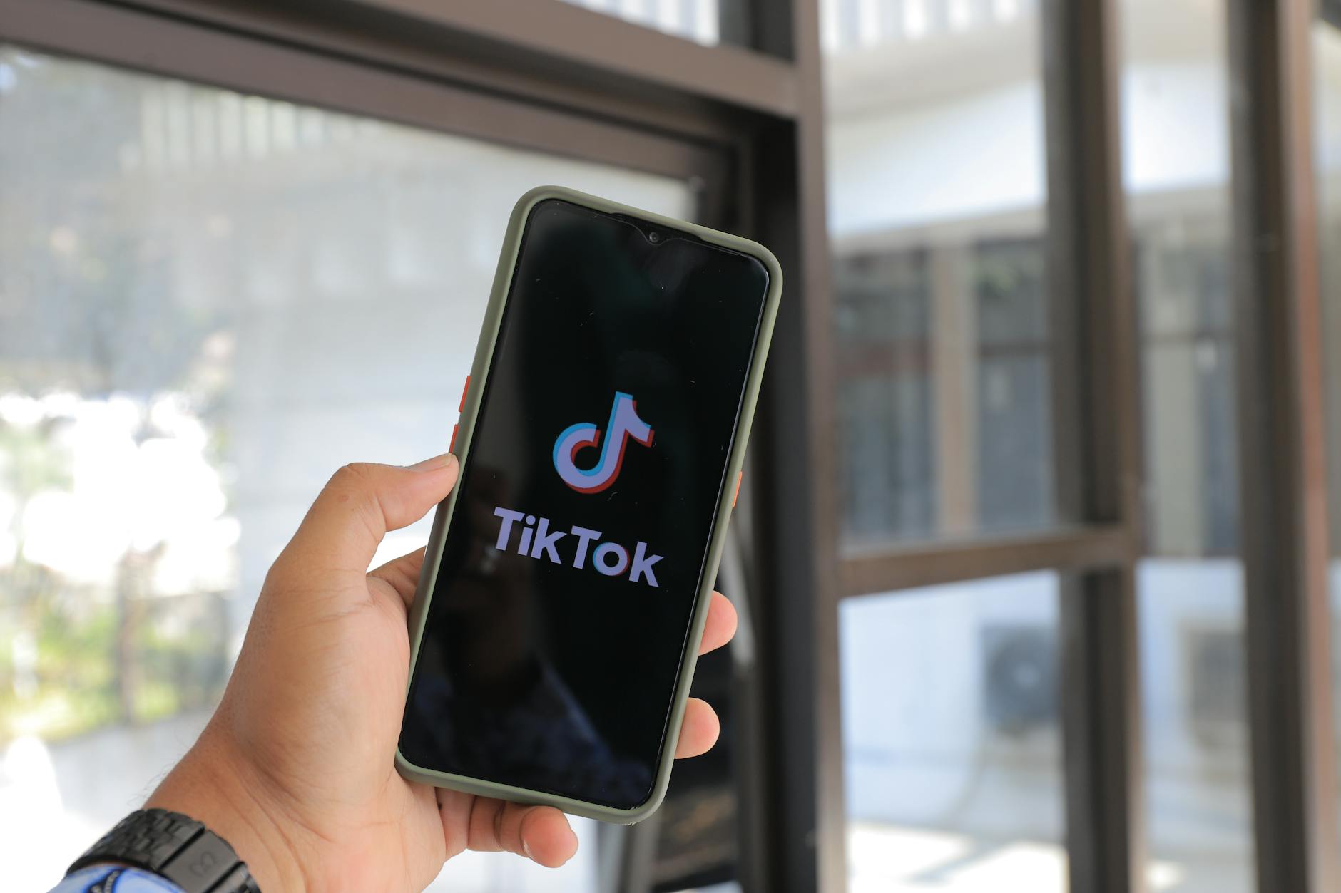 TikTok second account reveal showing split screen transformation